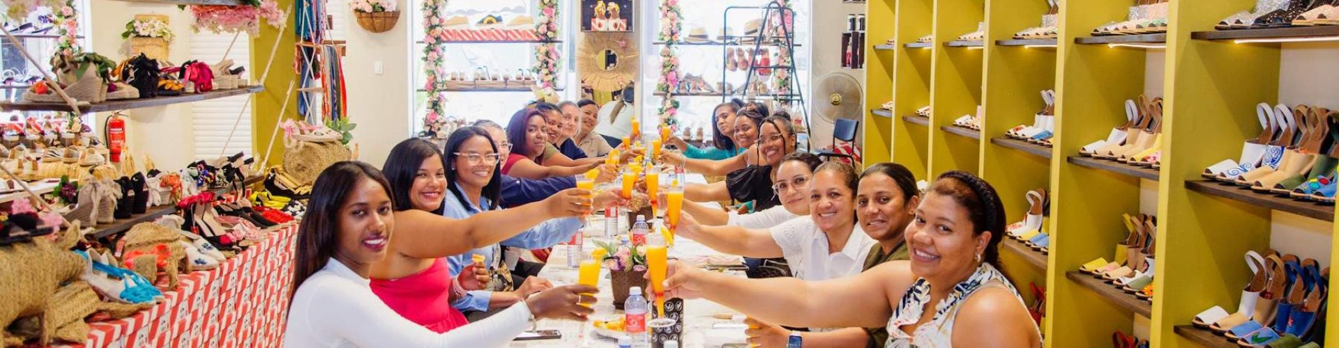 Group toasting with cava during the espadrille-making workshop in Barcelona